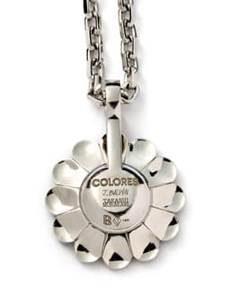'Morado' Flower Pendant - image 3 - close-up of pendant reverse showing the inscription