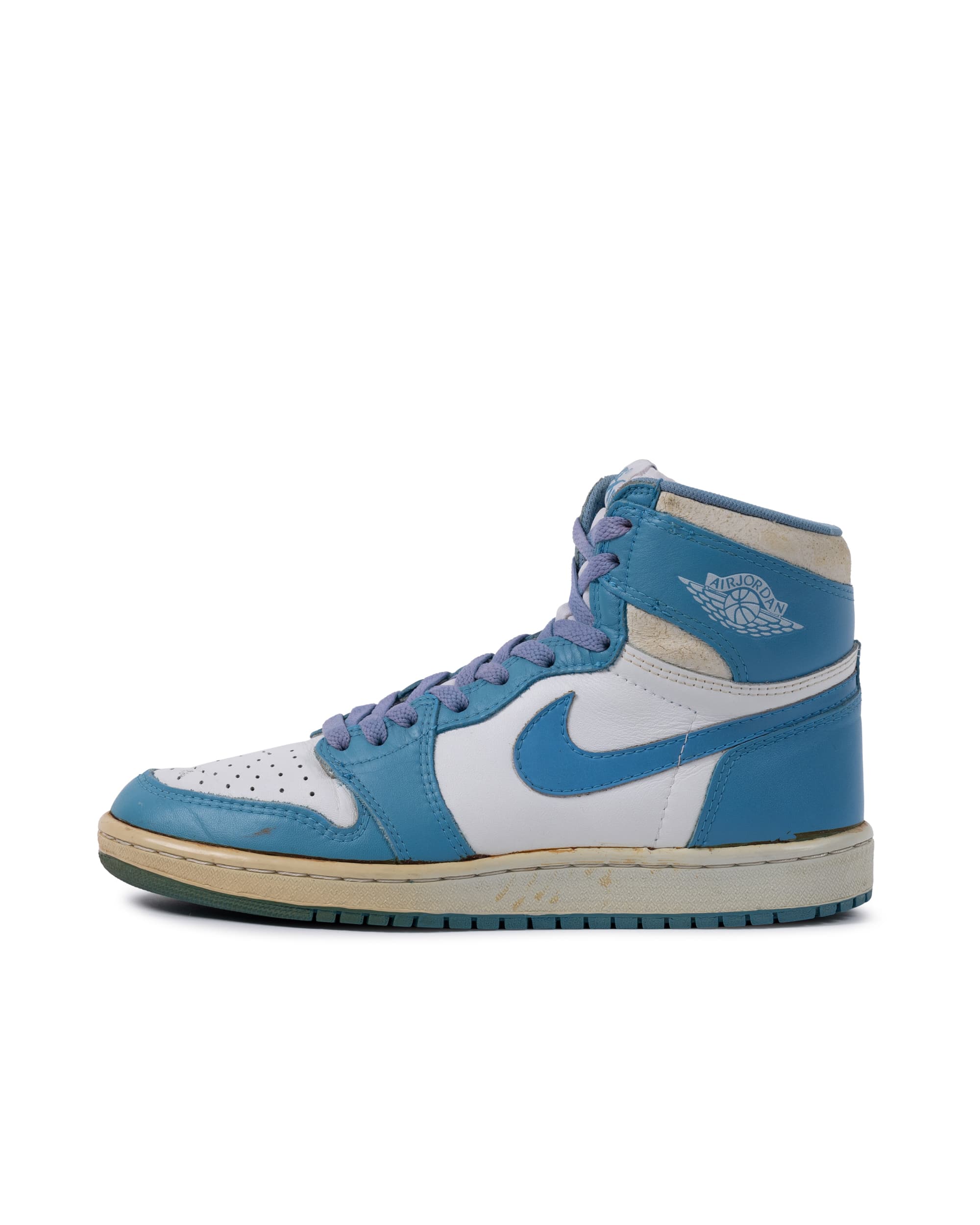 Air Jordan 1 High OG ‘Carolina Blue’ Sneaker - image 1 - outer side of left sneaker