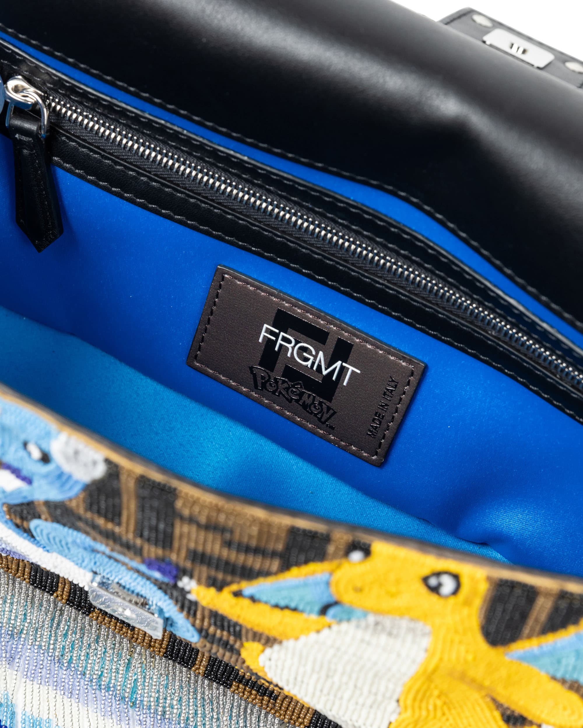 Beaded FF Pokemon Baguette - image 4 - interior lining with label and inside zipped pocket