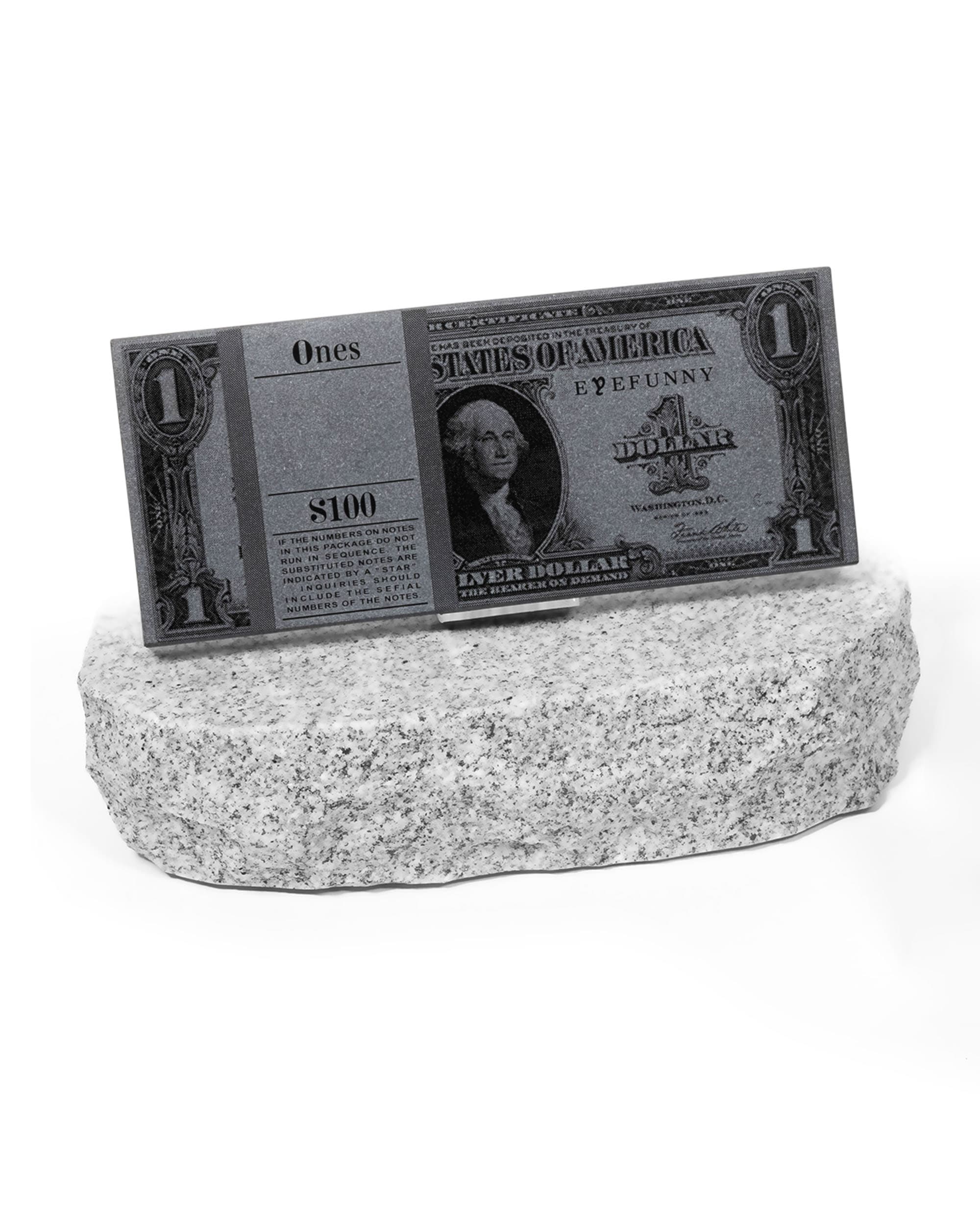"Cryptocurrencies" - image 2 - close-up of granite USD note and granite display shelf