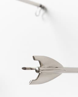 Five Brass Arrow Wall Hooks - image 5 - close-up image of the tail of one of the hooks