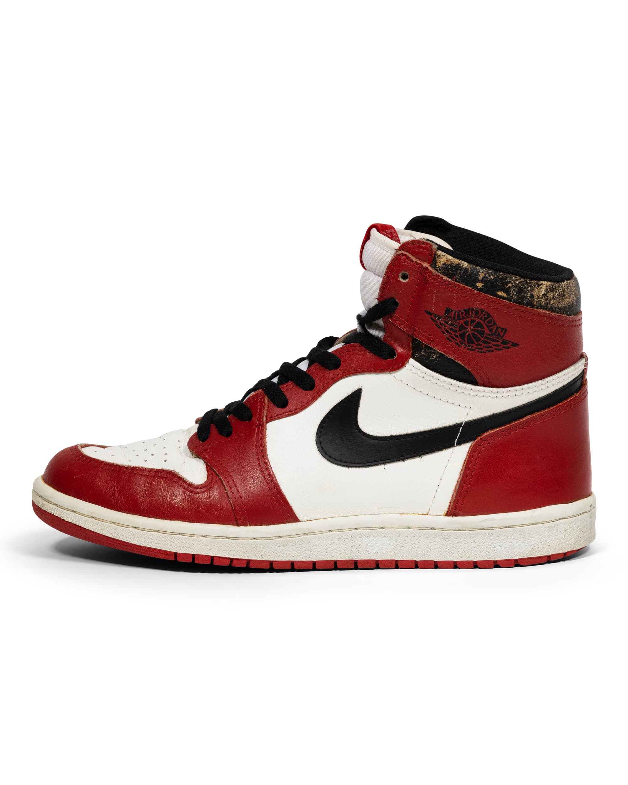 Air Jordan 1 Retro High OG Chicago Sneaker - image 1 - side view of shoe - Nike Swish and Air Jordan logo