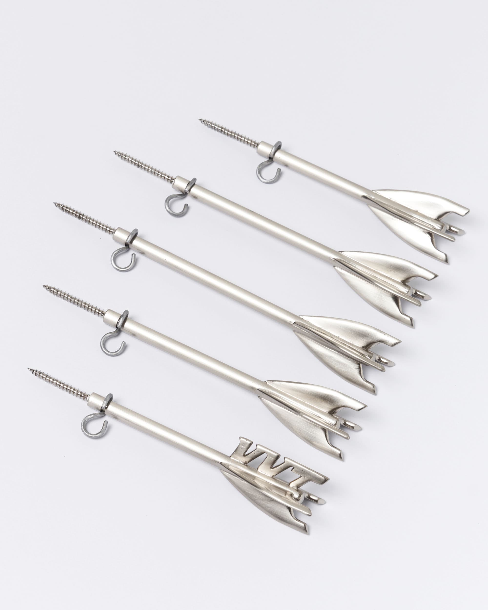 Five Brass Arrow Wall Hooks - image 3 - bird's eye showing the artwork