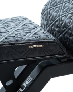 Rogue Fitness Chrome Hearts Plus Custom Leather AB-2 Adjustable Bench - image 6 - close-up of Chrome Hearts patches