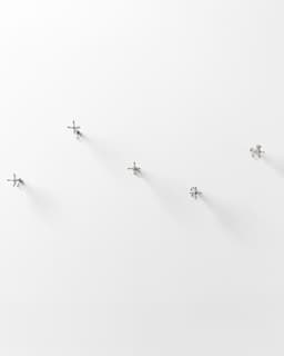 Five Brass Arrow Wall Hooks - image 11 - hooks embedded into wall