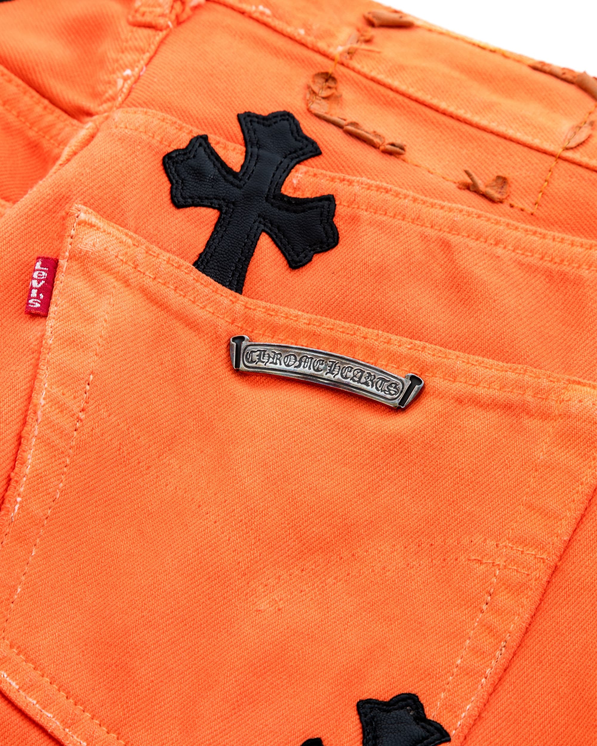 Vintage Levi's Black Cross Patch Orange Jeans - image 5 - close-up of back pocket
