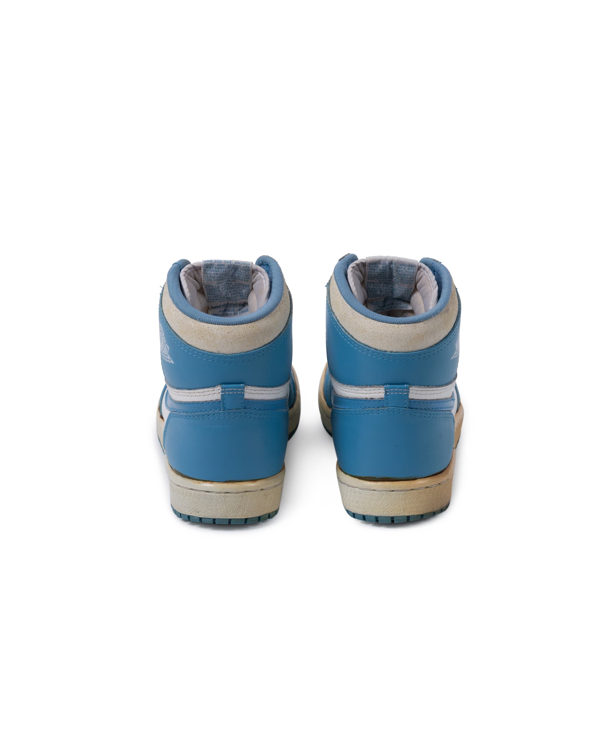 Air Jordan 1 High OG ‘Carolina Blue’ Sneaker - image 7 - back of sneakers - heels