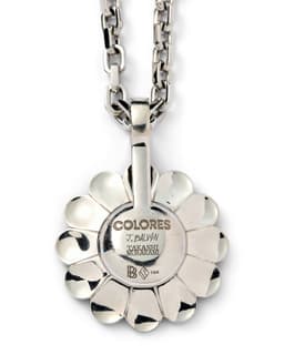 'Verde' Flower Pendant - image 3 - close-up of pendant reverse showing the inscription