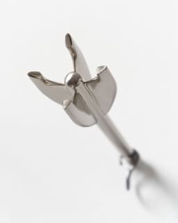 Five Brass Arrow Wall Hooks - image 6 - close-up of the tail of one of the hooks
